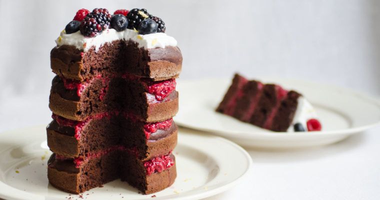 Chocolate layer cake with raspberry chia jam and coconut whipped cream {vegan}